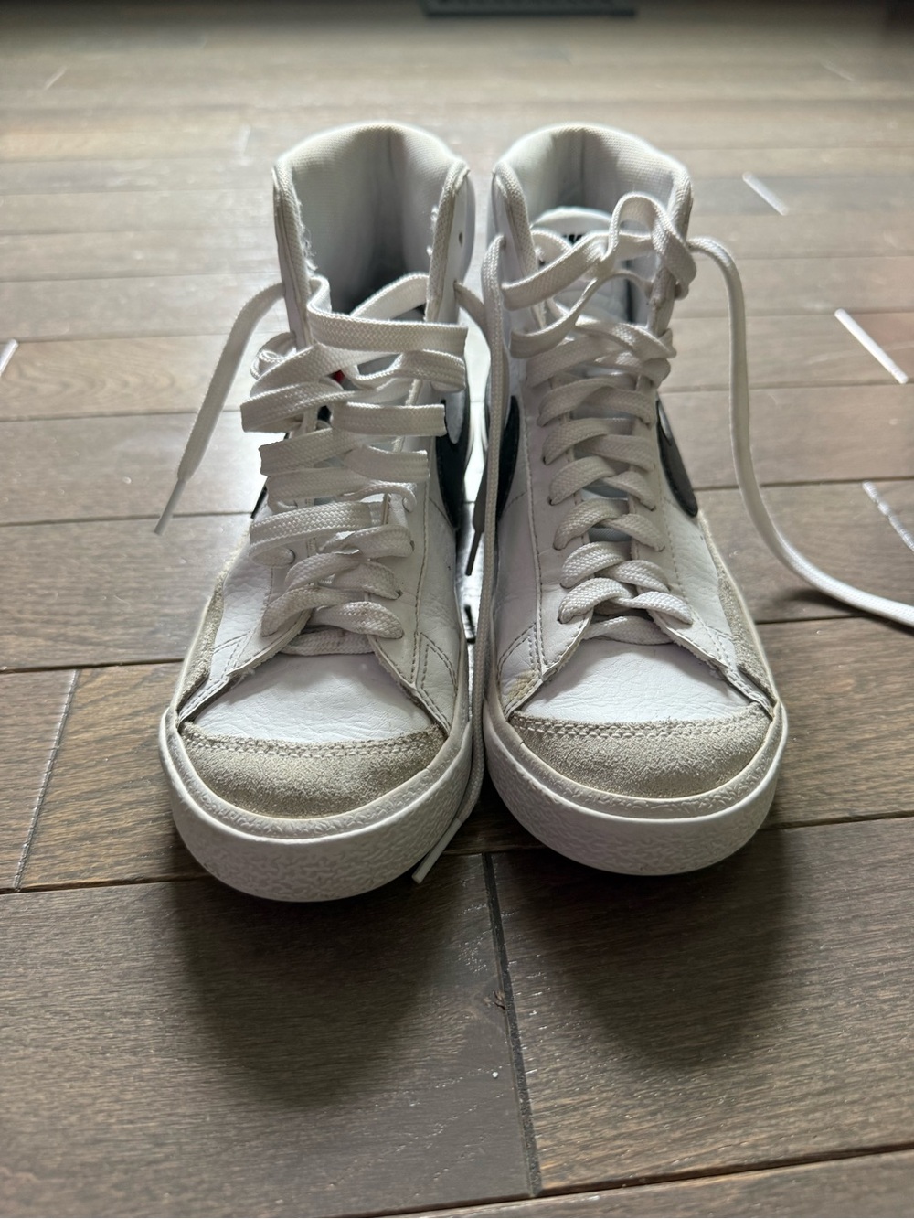 White High-Top Sneakers with Black Nike Blazers